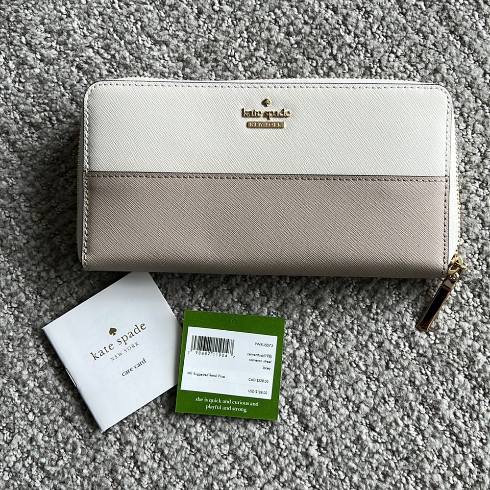 NWT Kate Spade zip wallet Dusty Pink/Greige and Ivory. 7.5” W x 4” H